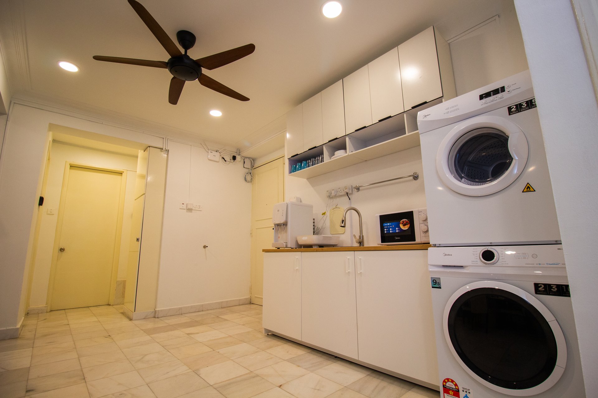 Downtown Condominium KL laundry and utility area prepared for short-term rental operations