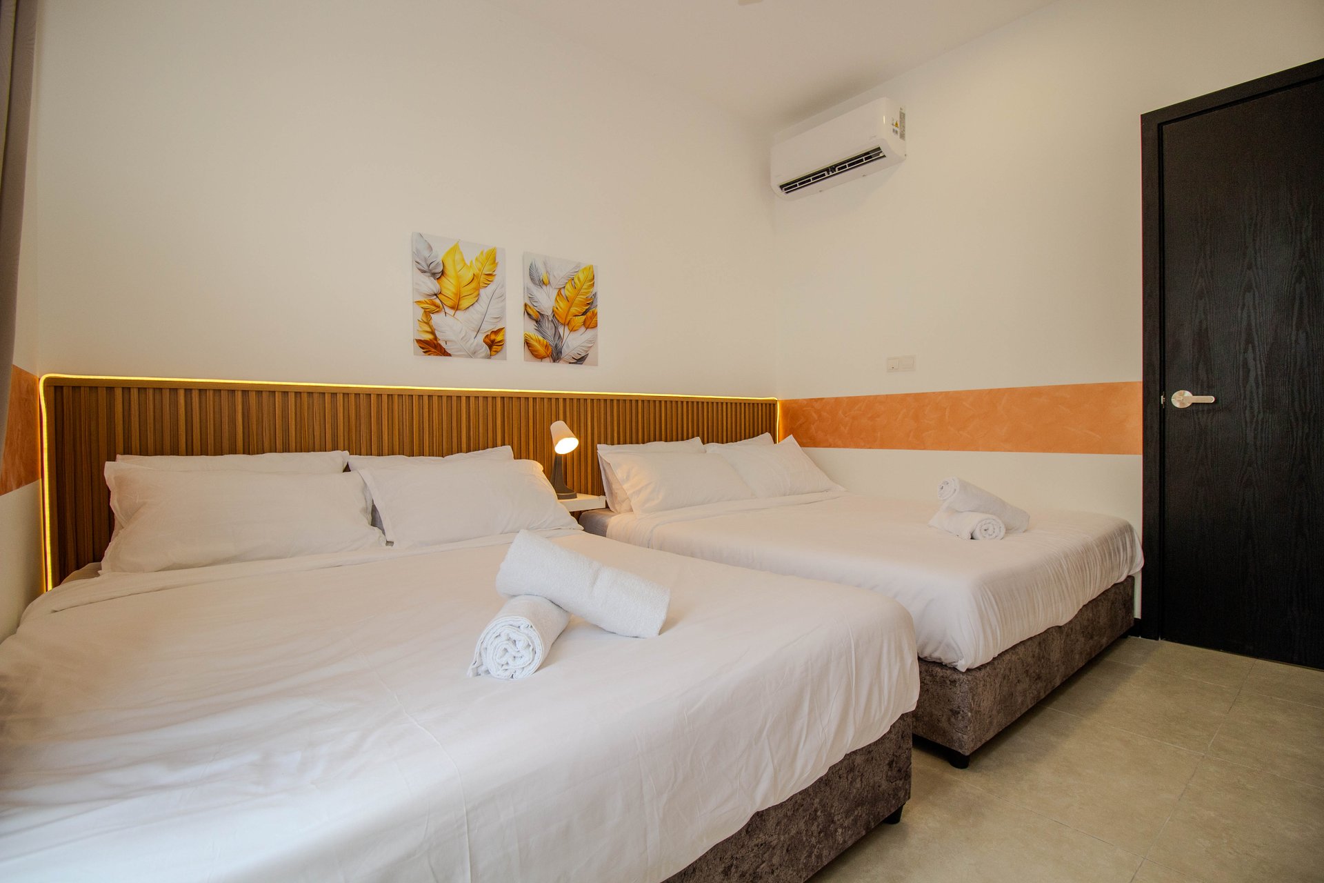 Bedroom at the Neu Suites three-bedroom short stay