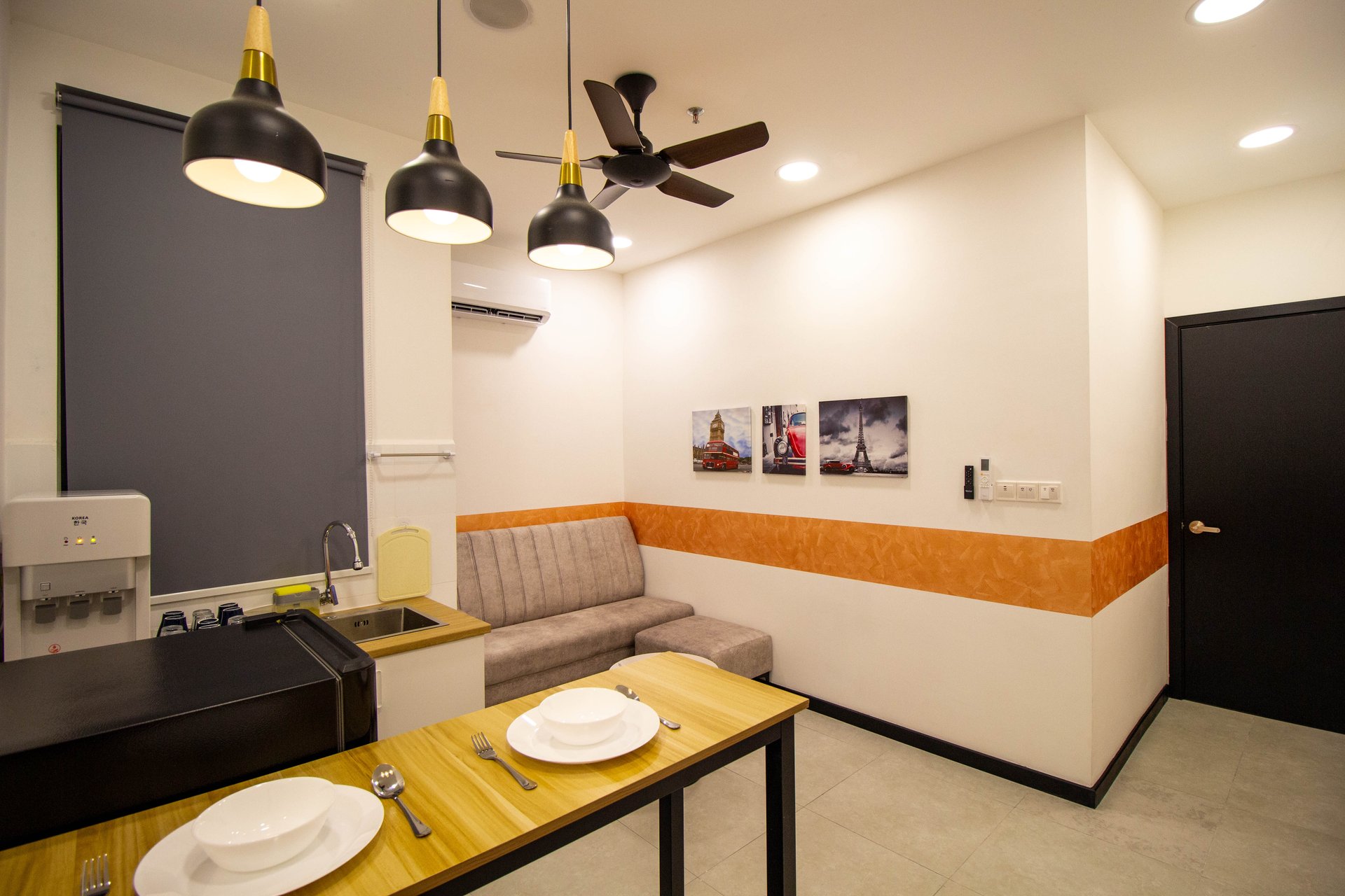 Living and dining area at the Neu Suites three-bedroom short stay