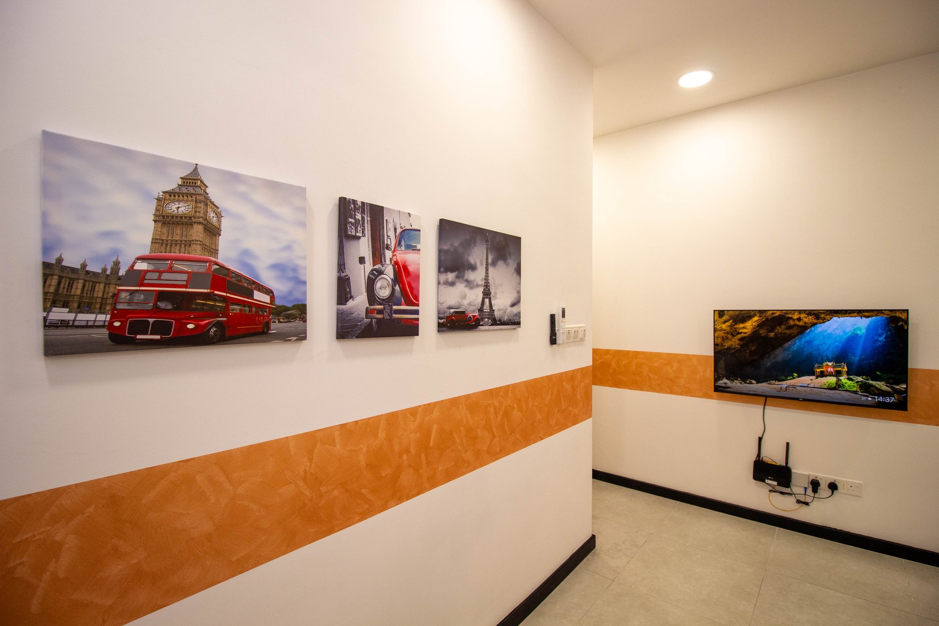 Lounge and television area at Neu Suites